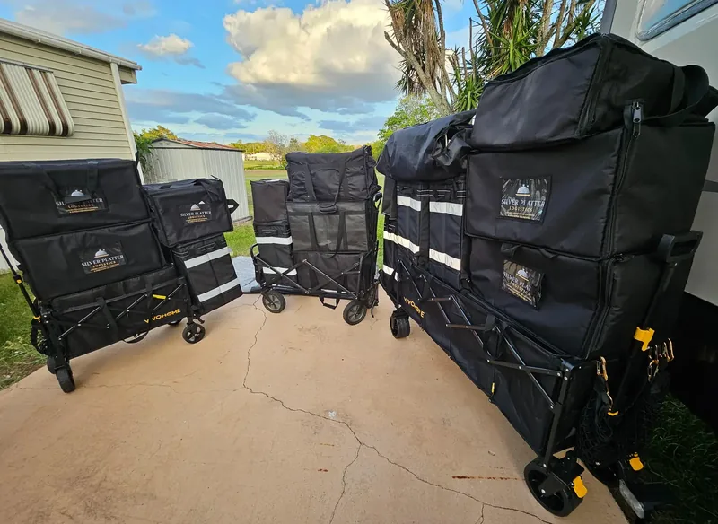 Silver Platter Logistics insulated catering bags secured on delivery carts